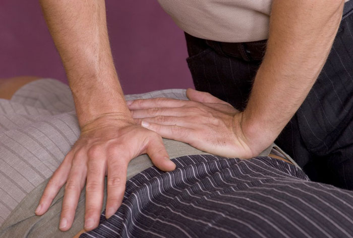 a patient receives a back massage 